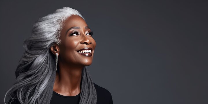 Older black woman with gray hair beauty photoshoot with copy space