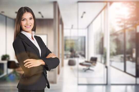 Happy smiling young manager woman in business office, AI generated image
