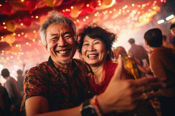 adult couple happy expression in a party enjoying .