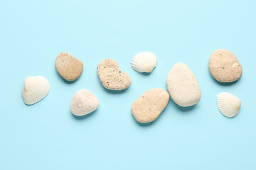 Many pebble stones on blue background