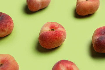 Sweet fig peaches on green background