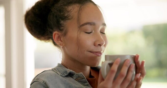 Happy young woman, coffee and thinking in home for scent, relax or peace for memory, calm or mindfulness. Girl, smile and tea cup for flavor, smell or remember with matcha, latte and drink in house