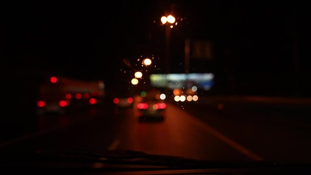 Bokeh light on road of night 