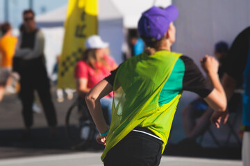 Female athletes play basketball, teenage team play street basketball, players on the outdoor...