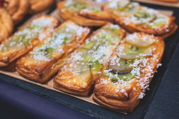 Pastry and bakery, selection assortment variety of different pastries, pie on a plate, baked desserts, catering or cafe banquet bakery table, set of coffee break during conference meeting