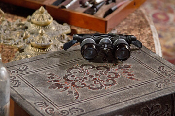 Antique book and medical equipment.