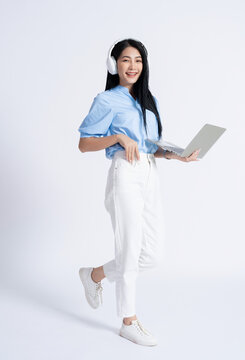 Photo of young Asian girl on white background