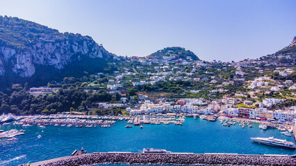 The Amalfi Coast is a breathtaking stretch of coastline in southern Italy, known for its vertiginous cliffs adorned with colorful villages, turquoise waters, and lush terraced gardens. 