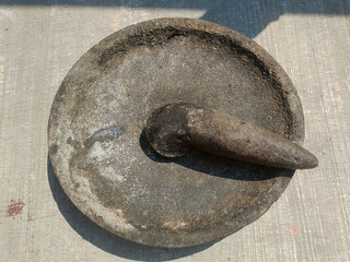 mortar or cobek in Indonesian is a traditional tool made of river stone and is used to grind spices