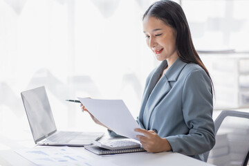 Business Documents, Auditor business asian woman checking searching document legal prepare paperwork or report for analysis TAX, accountant Documents data contract partner deal in workplace office.