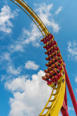 Rollercoaster Ride in Theme Park - 640494620