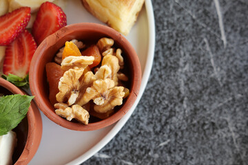 walnut on a plate on table 