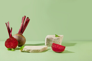 Empty rock podium displayed with beetroot on pastel green background.Antioxidants are loaded in...