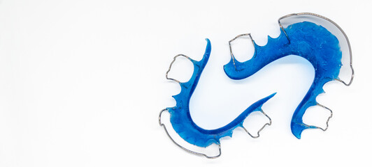 Blue hawley retainers, acrylic retainer, dental technician concept, selective focus, copy space,...