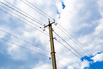 Power electric pole with line wire on colored background close up
