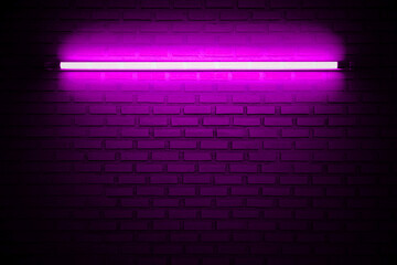 Purple neon bulb on empty brick wall with glowing purple neon lights. texture background.