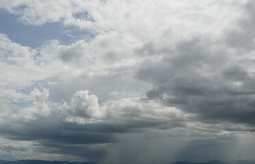 Obraz premium Cumulonimbus cloud formations on tropical sky , Nimbus moving , Abstract background from natural phenomenon and gray clouds hunk , Thailand