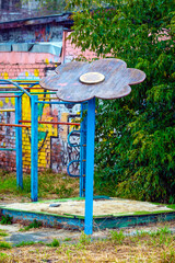 An abandoned empty playground on an autumn day