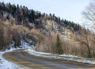 Winter road in the highlands, morning dawn, walking in the fresh air.