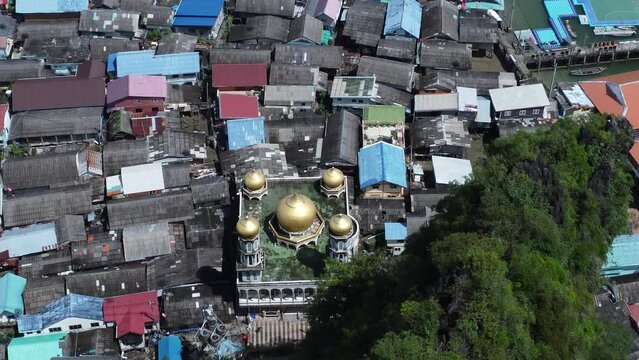 Koh Panyee, Mosque, in floating village on the sea in Phang Nga Bay. Thai religions. Aerial