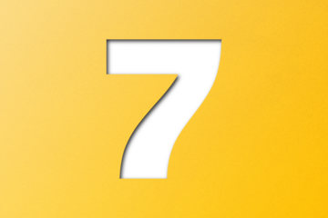 Yellow paper font number 7 isolated on transparent background.