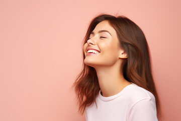 Fototapeta premium Cheerful Young Woman Model On Pastel Background . Сoncept Young Woman Modeling, Pastel Backgrounds, Cheerful Moods, Fashion Photography