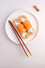 philadelphia japanese sushi rolls with salmon, cucumber and chee