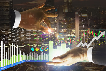 Stock financial index manipulated and control by businessman with graph, chart, candlesticks, number and arrow up symbol on metropolitan night scenic background.