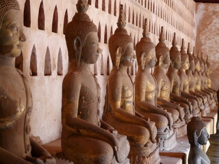 Golden buddha statues, Buddha statue at the ancient temple, peaceful image of a Buddha statue,...