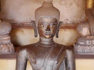 Golden buddha statues, Buddha statue at the ancient temple, peaceful image of a Buddha statue,...