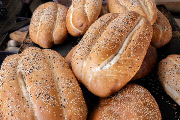 Fresh caucasian sesame bread for sale at local farmers market - 640535230