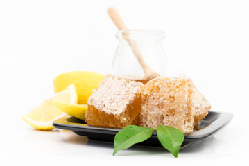 Honey Lemon with honeycombs on white