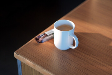 Morning coffee and a snack. Concept of cosy time spending.