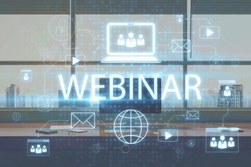 Close up of office workplace with computer and creative webinar hologram on blurry background. Online meeting and seminar concept. Double exposure.