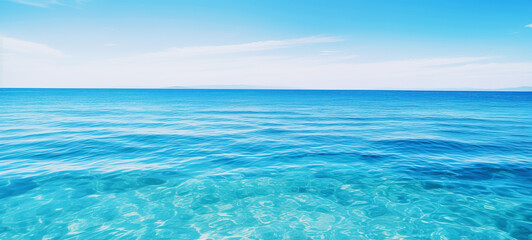 Obraz premium Tranquil sea water surface on coral, and sea fish tropical blue ocean underwater background