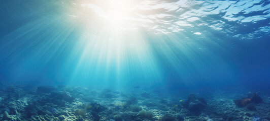 Fototapeta na wymiar Tranquil sea water surface on a sunny day. Underwater sea in sunlight, tropical blue ocean underwater background