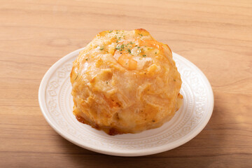 ポテトのチーズ焼き　オマールソース仕立て