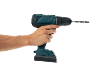 PNG, Male hand holds cordless drill, isolated on white background