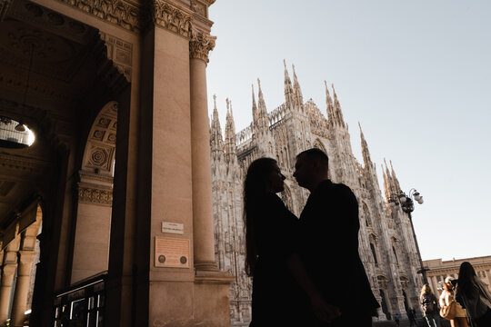 Silhouette of lovers on the background of the Duomo in Milan