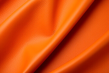 Texture orange leather or leatherette fabric for clothing bags and shoes and furniture