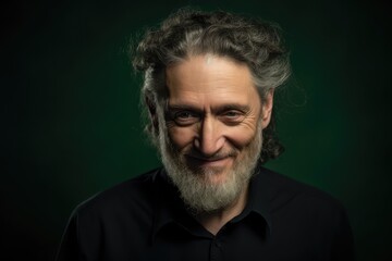 Fototapeta premium Happy mature man smiling, looking down. Green background. Photo generative AI