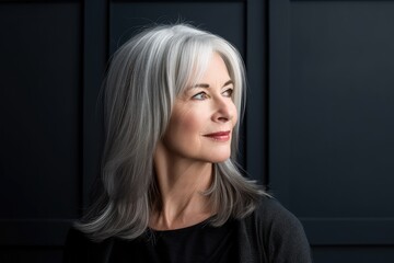 Fototapeta premium Elderly woman with gray hair gazing elsewhere. Photo generative AI