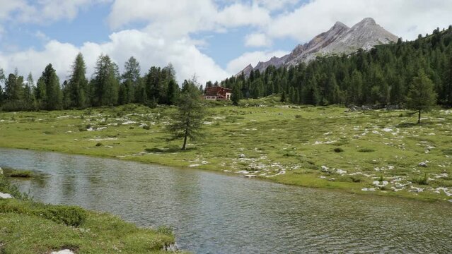 Le Vert Lake near the Lavarella Hut in the Greenery of the Fanes - Sennes - Braies Nature Park, Alpi Mountains, Italy