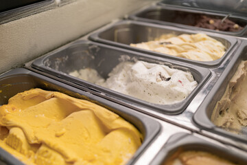Big choice of ice cream. Italian gelateria. Ice-cream showcase in cafe