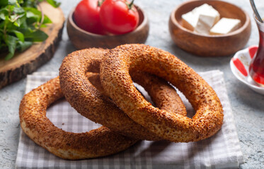 Turkish fast food bagel called Simit. Turkish bagel Simit with sesame. Bagel is traditional Turkish bakery food. Turkish name; simit - gevrek