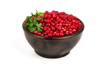 Lingonberries in a pot, isolated on white background.