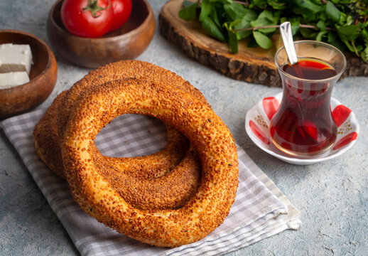 Turkish fast food bagel called Simit. Turkish bagel Simit with sesame. Bagel is traditional Turkish bakery food. Turkish name; simit - gevrek