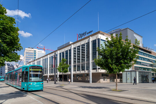 modern opera house in Frankfurt at Willy Brandt square with streetcar.