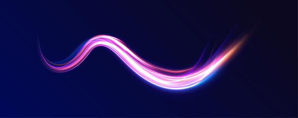 Long exposure of motorways as speed. Neon spiral lines in yellow blue and purple colors.  Image of speed motion on the road. 