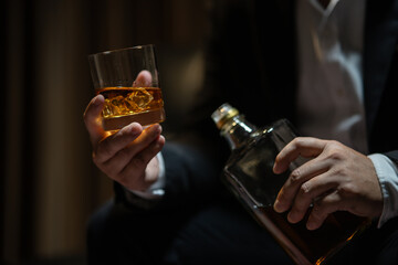 Whisky is poured into glass Beautiful bokeh